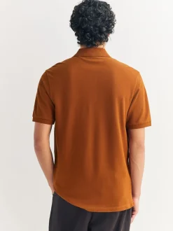 Next - Ajustement régulier - Polo Manches courtes Pique Ambre orange Clearance