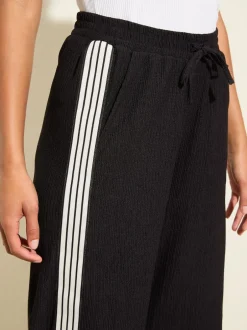 Friends Like These - Effet froissé Pantalon ample en jersey Bande noire Outlet