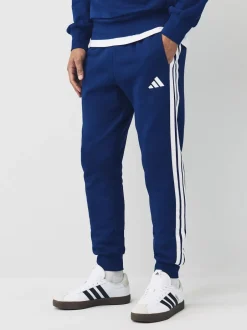 adidas Bleu - Essentiels Pantalon de jogging polaire à rayures 3 Outlet