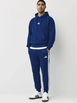 adidas Bleu - Essentiels Pantalon de jogging polaire à rayures 3 Outlet