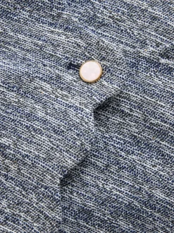 Next Bleu - Veste bouclée sans col festonné Best