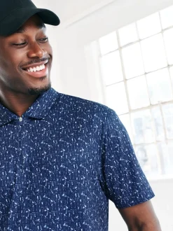 Next Bleu marine - Polo de golf à imprimé géométrique actif Sale