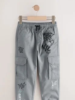 Next - Pantalon cargo (3-16ans) Bleu motif graffiti Online