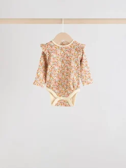 Next Bleu/Crème/Coral Ditsy - Body à volants et manches longues bébé Lot de 4 (0mois2ans)