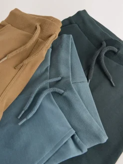 Next Bleu/Fauve Marron/gris anthracite - Lot de 3 joggings super skinny (3mois-7ans) Online