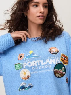 Next - Pull en maille à col rond en laine Broderie avec écusson bleu clair Outlet