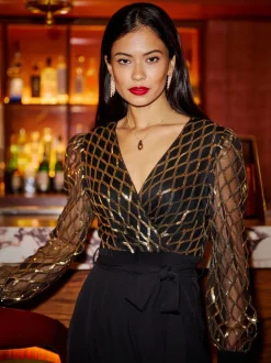 Yumi Combinaison enveloppante à sequins Hot