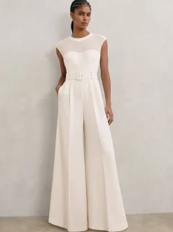 Reiss Combinaison-pantalon ceinturée à jambe large et empiècements transparents Alba Hot