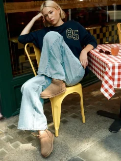 Next Daim taupe neutre - Bottes en fausse fourrure déperlantes Sale