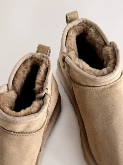 Next Daim taupe neutre - Bottes en fausse fourrure déperlantes Sale
