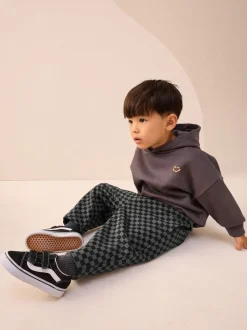 Next - Joggings Jambe large en jersey (3mois à7ans) damier Noir et blanc Outlet