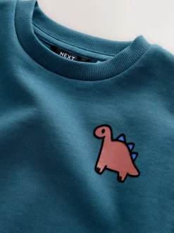 Next - Sweat-shirt en jersey à col rond imprimé au dos (3mois7ans) Dinosaure bleu Outlet