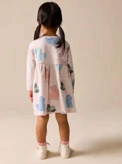Next Dinosaure crème - Robe à manches longues en jersey (3mths-7yrs) Outlet