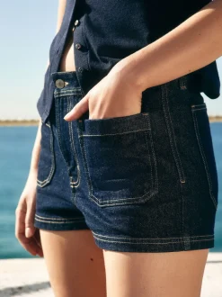 Next Délavage bleu - Mini-short en Denim à poches plaquées