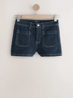 Next Délavage bleu - Mini-short en Denim à poches plaquées