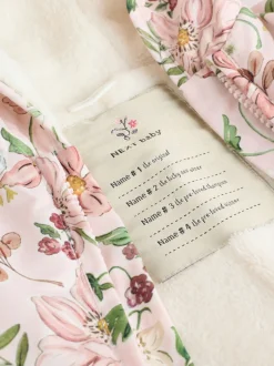 Next Double zip imprimé fleuri rose - Combinaison à capuche en nylon bébé (0mois-2ans) Clearance