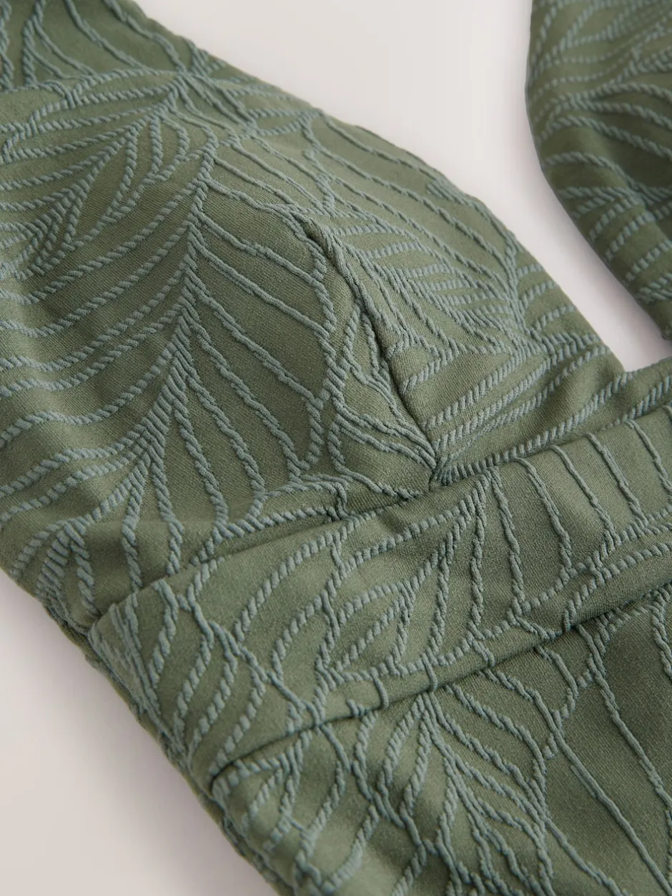 Next - Maillot de bain plongeant et galbant avec contrôle du ventre Feuille vert kaki texturée Outlet