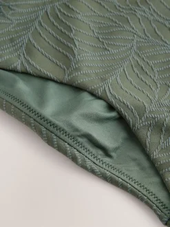 Next - Maillot de bain plongeant et galbant avec contrôle du ventre Feuille vert kaki texturée Outlet