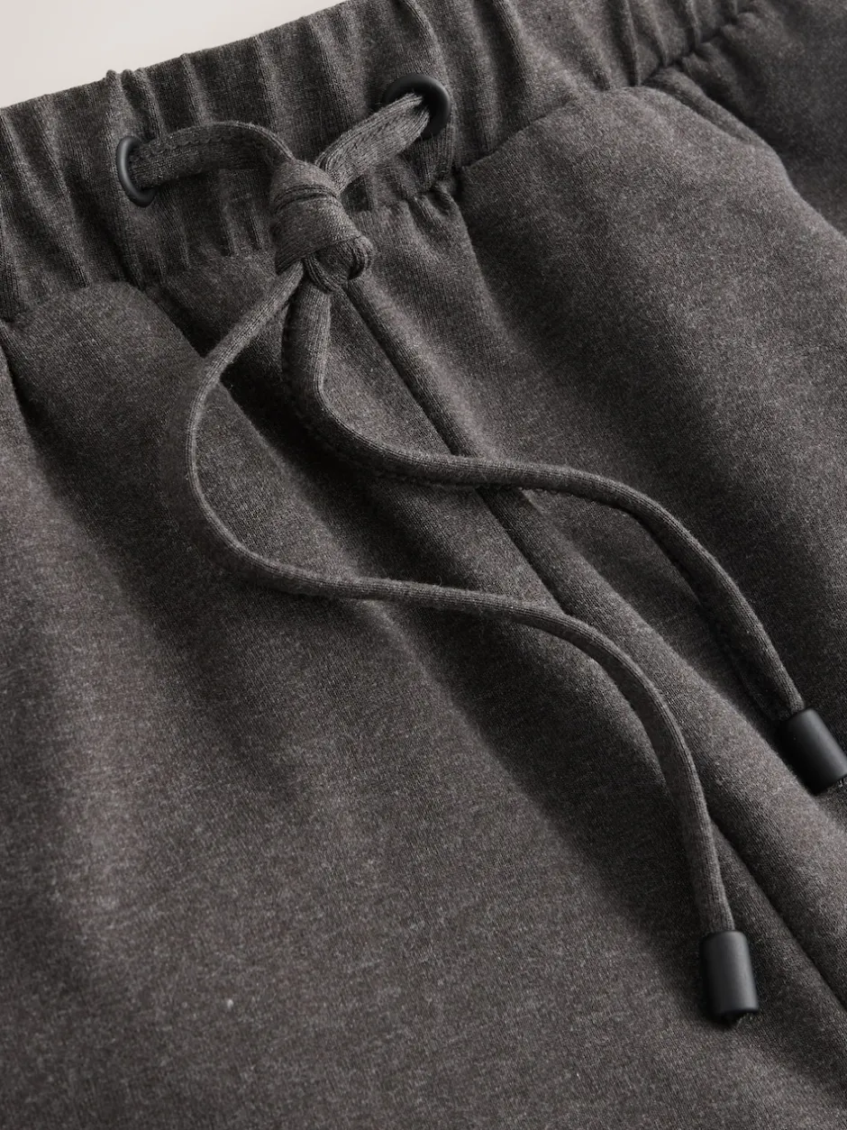 Next Gris de charbon de bois - Joggings à jambe large en jersey Outlet