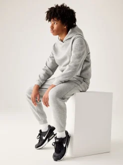 Nike Gris foncé chiné - Pantalon de jogging Club en polaire Clearance