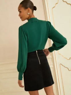 Love & Roses jupe courte en velours côtelé New