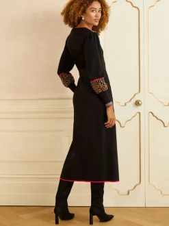 Love & Roses Robe mi-longue en maille à col en V