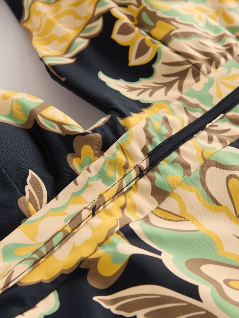 Next - Maillot de bain plongeant et galbant avec contrôle du ventre Motif paisley noir/vert Sale