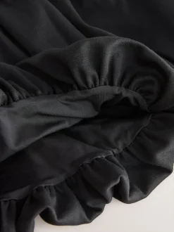 Next Noir - Jupe à enfiler en jersey extensible à ourlet boule (3-17ans) Discount