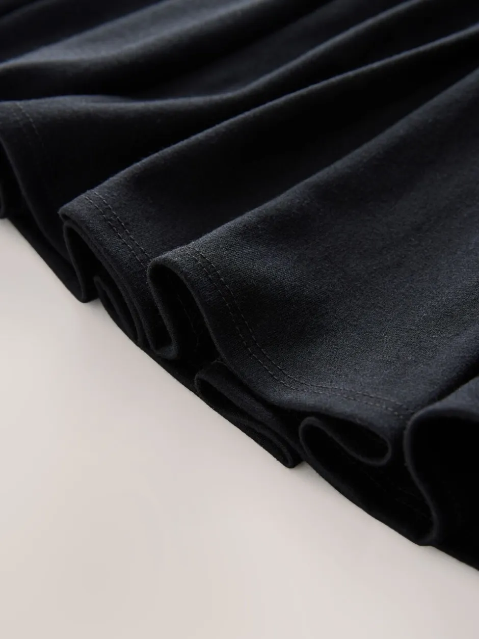 Next Noir - Jupe d’école plissée extensible en jersey (3-17ans) Clearance