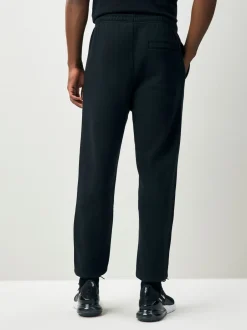 Nike - Pantalon de jogging Club en polaire Noir