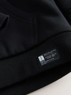 Next Noir - Sweat à capuche zippé en polaire Borg (3-16ans) Outlet