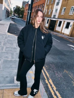 Never Fully Dressed Noir brodé - Leggings évasés en coton New