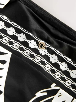 Next - Maillot de bain Bandeau gainant à jambes froncées Noir/Crème Palmier