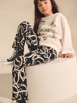 Next - Leggings évasés à côtes (3-16ans) Nœud noir/blanc Sale