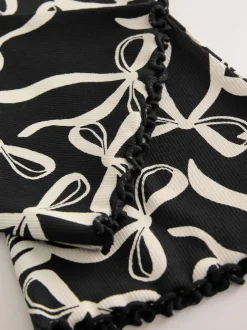 Next - Leggings évasés à côtes (3-16ans) Nœud noir/blanc Sale