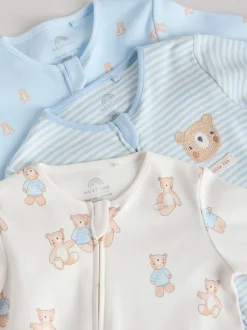 Next Ours bleu - Combinaisons de nuit à fermeture éclair pour bébés 3 Pack (0mths-3yrs) Online