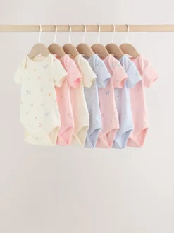 Next Personnage pastel multicolore - Lot de 7 bodies bébé à manches courtes New