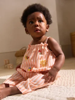 Next Rayé orange/blanc - Salopette tissée 100% coton bébé (0mois-3ans)