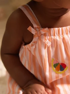 Next Rayé orange/blanc - Salopette tissée 100% coton bébé (0mois-3ans)