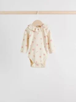 Next Rose / Crème / Marron Ditsy - Body à volants et manches longues bébé Lot de 4 (0mois2ans) Best