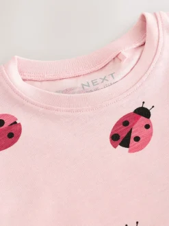 Next - T-shirt péplum à manches courtes (3mois-7ans) Rose motif coccinelles