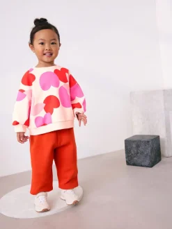 Next - Ensemble Sweat-shirt et jogging Coupe ballon (3mois -7ans) Rose/rouge motif cœurs Online