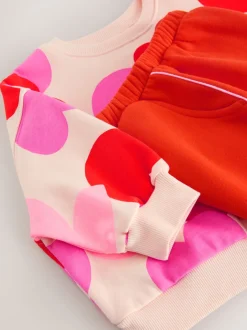 Next - Ensemble Sweat-shirt et jogging Coupe ballon (3mois -7ans) Rose/rouge motif cœurs Online