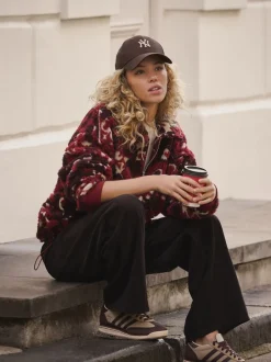 Next Rouge bordeaux à fleurs - Sweat-shirt en polaire jacquard Teddy Borg à quart de zip