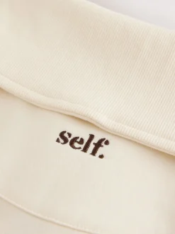 self. soi-même. Sweat-shirt à col zippé