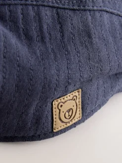 Next Tissé bleu marine - Bonnet plat pour bébé (0mths-2yrs) Clearance