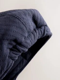 Next Tissé bleu marine - Bonnet plat pour bébé (0mths-2yrs) Clearance