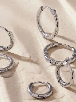 Next Tonalité argentée - Boucles d'oreilles Huggie Hoop en acier inoxydable 3 Lot Best