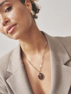 Next Tonalité d'or - Collier chaîne trombone en résine Best