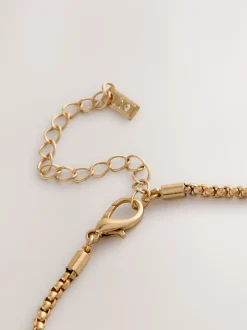 Next Tonalité d'or - Collier long à fleurs